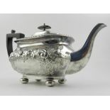 William Hutton & Son, an early 20th century silver plated teapot, repousse embossed with flowers,