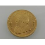 A 1982 South African gold Kruggerand (1 ounce).