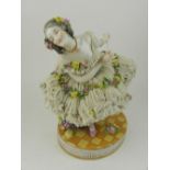 In the manner of Augustus Rex. A Dresden porcelain figural study of a ballerina, bears factory