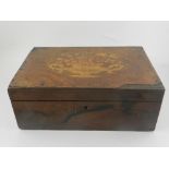 A Victorian rosewood box, inlaid with flower decoration to top.