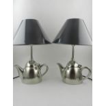 A pair of Contemporary table lamps in the form of teapots.