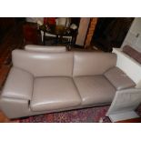 A contemporary grey leatherette two seater sofa W.