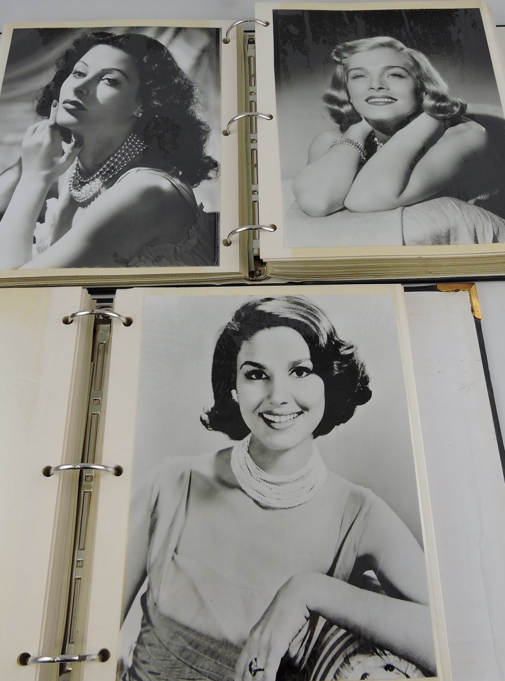 Two albums of monochrome and colour studio photographs, American actresses, 1950s-1980s.