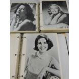 Two albums of monochrome and colour studio photographs, American actresses, 1950s-1980s.