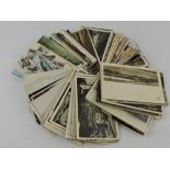 A collection of black and white, polychrome and sepia postcards, mainly UK views with some European.