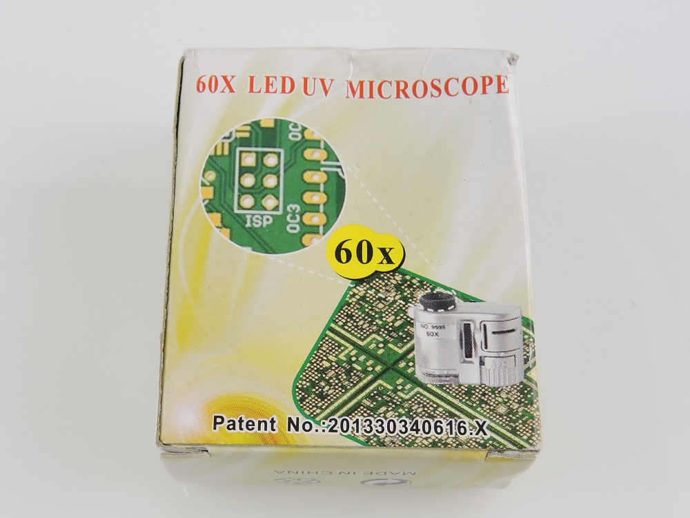 A miniature microscope, with light and 60x magnification.