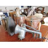 A Victorian copper kettle, vintage mincer, a set of three graduated copper measures and a flat iron,