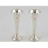 A pair of silver trumpet shaped bud vases, Birmingham 1995, 1ozt.