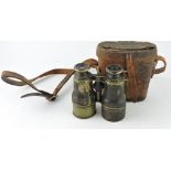 A pair of early 20th century brass and leather clad field glasses by Callaghan, 23a Bond Street,