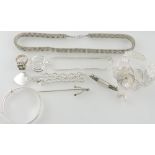 A quantity of white metal jewellery including a bracelet with heart shaped pendant,