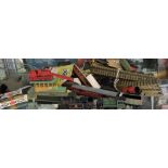 A quantity of Hornby Dublo trains, carriages and accessories including an 0 4 0 tank engine,