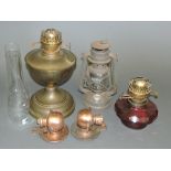 A brass oil lamp,