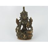 A Tibetan bronze figure of Buddha, H. 8cm.