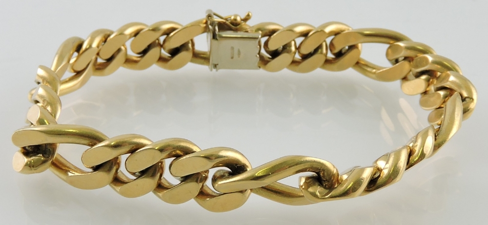 A heavy 18ct yellow gold flat curblink bracelet, L 21 cms, stamped 750, 73 gr.