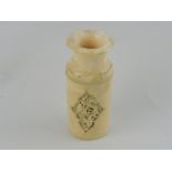 An early 20th century ivory cylindrical shaped brush pot,