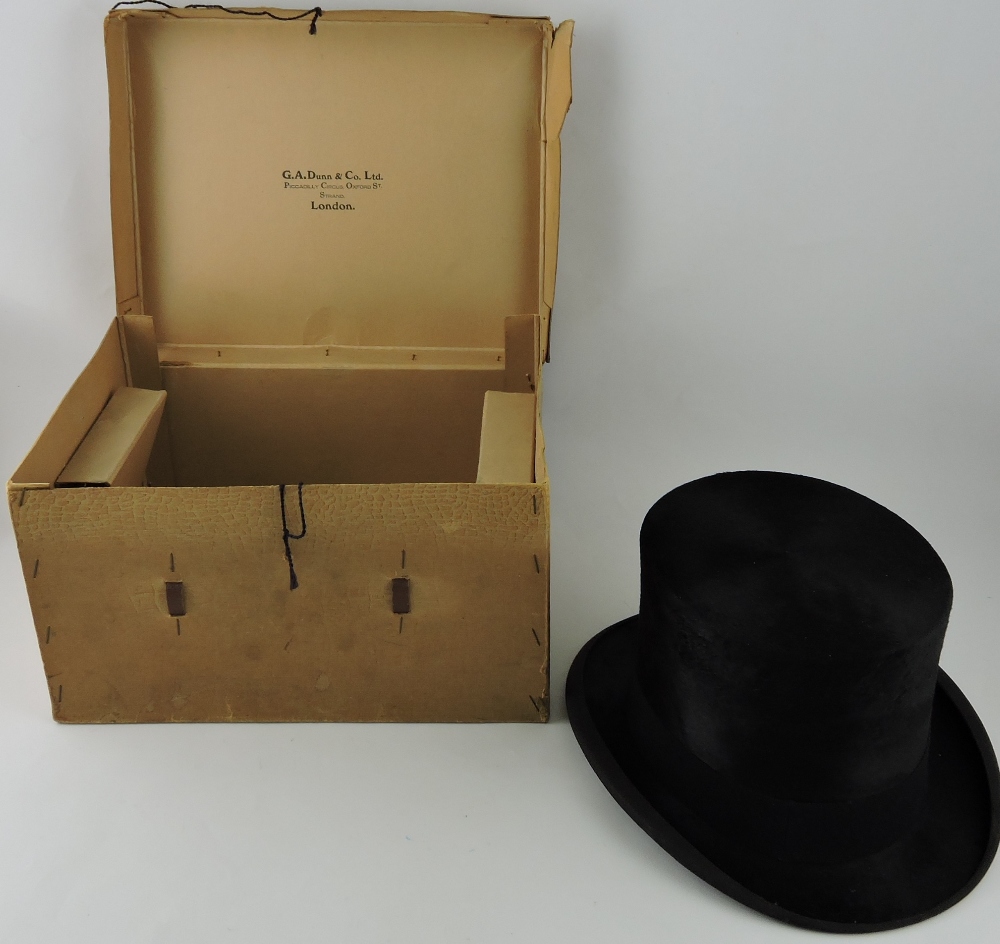A gentleman's black silk top hat by Dunn & Co. - Image 2 of 2