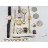 A quantity of gentleman's and ladies wristwatches including Timex and Seconda.