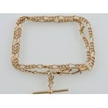 A 9ct yellow gold curblink watch chain with plain oval link divisions and bar. L.
