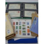 A large collection of GB and world stamps, including first day covers etc.