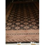 A Caucasian black and pale grey ground carpet,