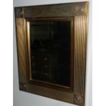 A Contemporary gilt framed bevel mirror.