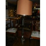 A 20th century floor lamp with shade. H.