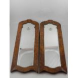 A pair of Venetian style walnut wall mirrors. H: 57cm W: 22cm