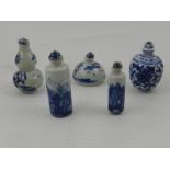 Five blue and white Chinese snuff bottles.