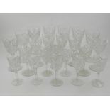 A collection of star and hobnail cut glass wines etc.