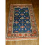 An Afghan blue ground prayer rug, decorated to centre with geometric pattern,