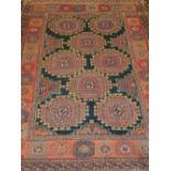 A Persian afshar rug, having elephant pad motifs to centre, multi-bordered and fringed.