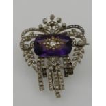 A late 19th century diamond and amethyst brooch,