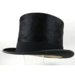 A Top hat, 7 3/4 inches.