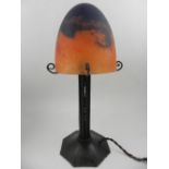 Daum, Nancy, France. An Arts and Crafts style table lamp, having domed glass shade, signed. H.