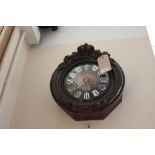 A late 19th century French wall clock, with carved walnut case,