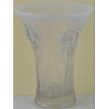 A pressed glass vase by Barolac, of trumpet for with opalescent band and moulded with irises, H.