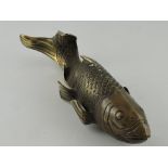 A bronze koi carp, in a dynamic pose, L. 31cm.