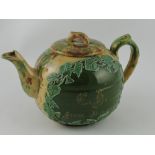 A late 19th century Dunmore Whieldon teapot, of dribbled  green and brown glaze,