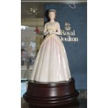A Royal Doulton porcelain figure Queen Elizabeth II designed by Peter Gee HN 3440, H.