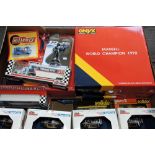 A collection of die-cast including five Nigel Mansell World Champion 1992 collector's edition,