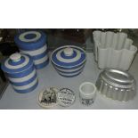 Three TG green cornishware kitchen jars and covers together with a Victorian Shelley jelly mould,