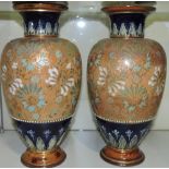 A pair of late Victorian Royal Doulton glazed earthenware vases by Florrie Jones, H.