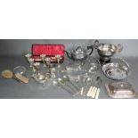 A quantity of plated ware, including a two-handled rose bowl, a teapot, a bottle frame,