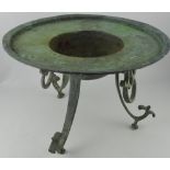 A verdigris bronze circular torchere in the classical manner, the central bowl within a broad rim,