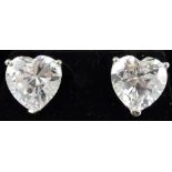 A pair of cubic zirconia heart-shaped ear studs.