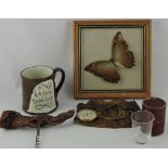 An earthenware frog mug, together with a corkscrew, thermometer, framed moth and measuring glass,