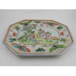 A Chinese Canton octagonal porcelain serving dish, decorated with figures in a landscape,