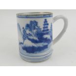 An 18th century Chinese blue and white small tankard,