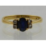 An 18 carat yellow gold, sapphire, and diamond ring,