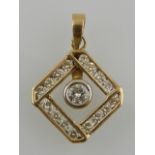 A 14 carat yellow gold and diamond kite-shaped pendant, set central diamond of approx. 0.